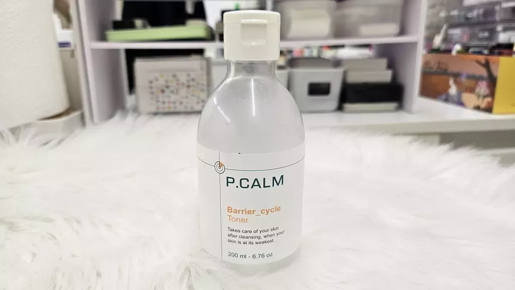 How-to-fix-damaged-skin-barrier-7-day-guide: The Ultimate Recovery Plan 2 A close-up shot of P.CALM Barrier_cycle Toner, a soothing ceramide toner used for an effective skin barrier repair experience and calming irritated skin.