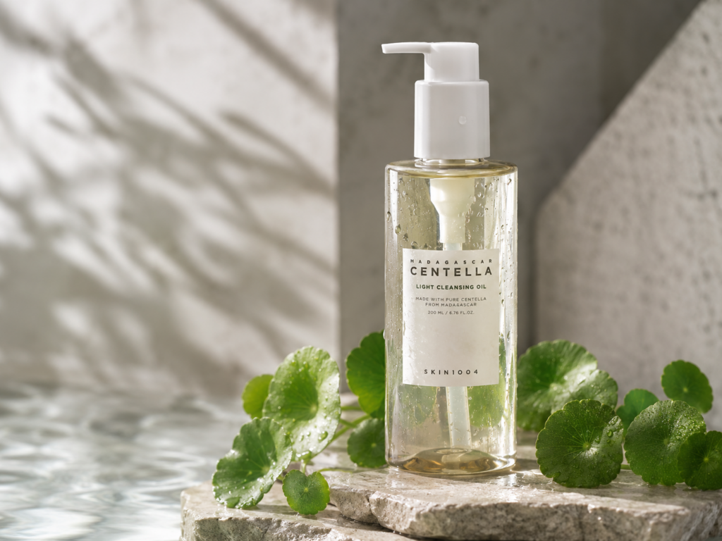 Why Most Sunscreens Cause Breakouts: The Mineral vs. Chemical Guide for Reactive Skin 2 A minimalist flatlay of a Korean cica cleansing oil, showing how proper emulsification prevents why most sunscreens cause breakouts.