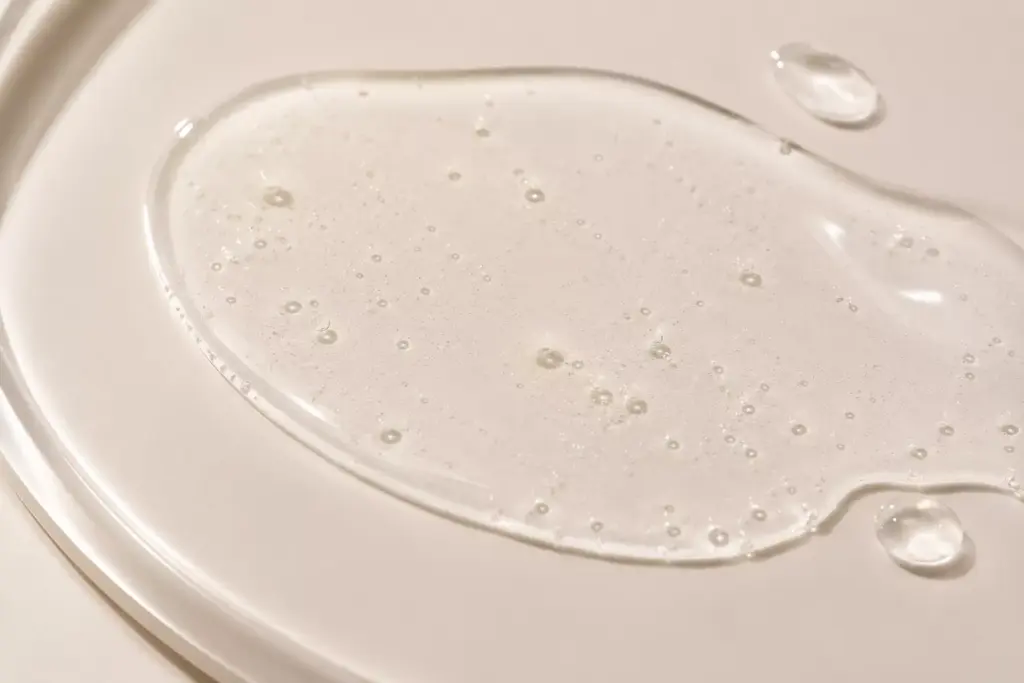 Why Your Sunscreen is Pilling Under Makeup: The K-Beauty Secret to a Flawless Base 2 Lightweight watery K-beauty sun essence texture that prevents why your sunscreen is pilling under makeup.