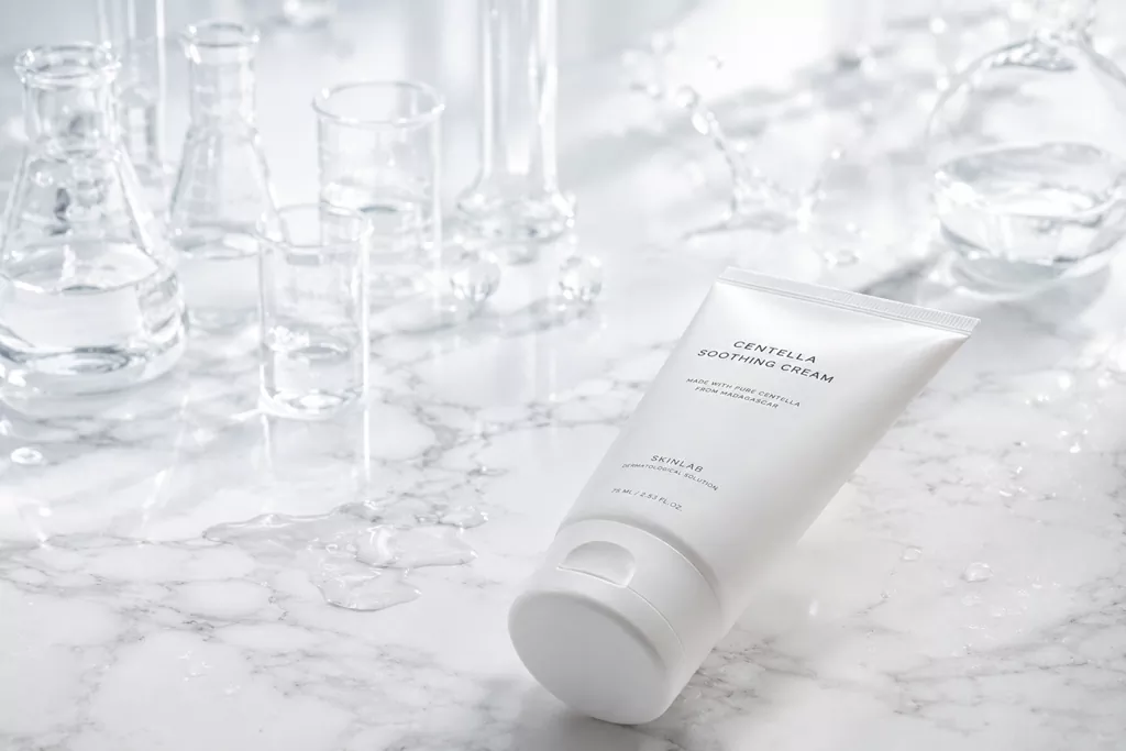 Aestura Atobarrier 365 Cream: An Honest Audit 2 Aestura Atobarrier 365 Cream tube placed in a clean, scientific laboratory setting emphasizing clinical skin barrier repair.